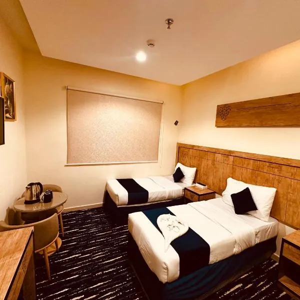 فندق النمارق المتميزة توصيل مجاني للحرم Al Namarq Distinguished Hotel Free hourly shuttle to Al Haram，位于An Naqāʼ的酒店