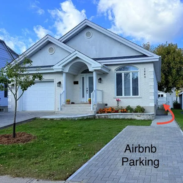 Charmant appartement au sous-sol，位于隆格伊的酒店