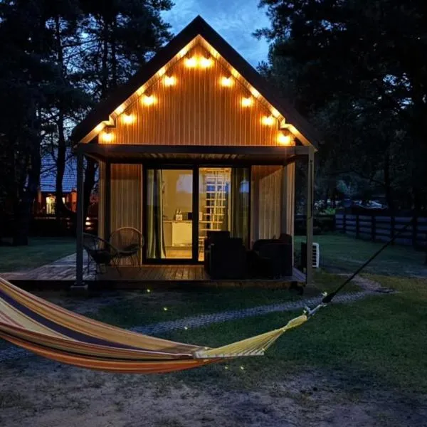 Osada pod Gwiazdami Łasko & SPA - Deluxe, ogrodzony, JEZIORA, ognisko, taras, dodatkowa sypialnia, Plaża, KAJAKI, dostępna SAUNA i JACUZZI，位于Łasko的酒店