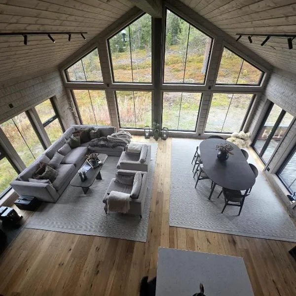 Unique hytta with jacuzzi, sauna, 7 bedrooms，位于特吕西尔的酒店