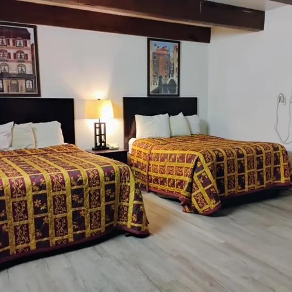 Budget Inn & Suites -Super-Ice Cold Spotless Rooms- Door-to-Door Lit Parking & Lowest Price plus HBO Max,Spanish TV, Internet free!!，位于Freer的酒店