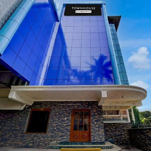 Super Townhouse Green Field Stadium Karyavattom，位于Kazhakuttam的酒店