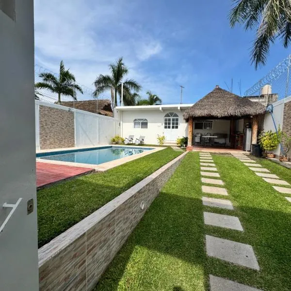 Casa Gaviota Casa Con Alberca y Palapa，位于特克塞丁戈的酒店