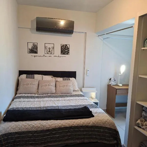 AP compartilhado Quarto aconchegante em Camboriú 10 min de BC，位于坎博里乌的酒店