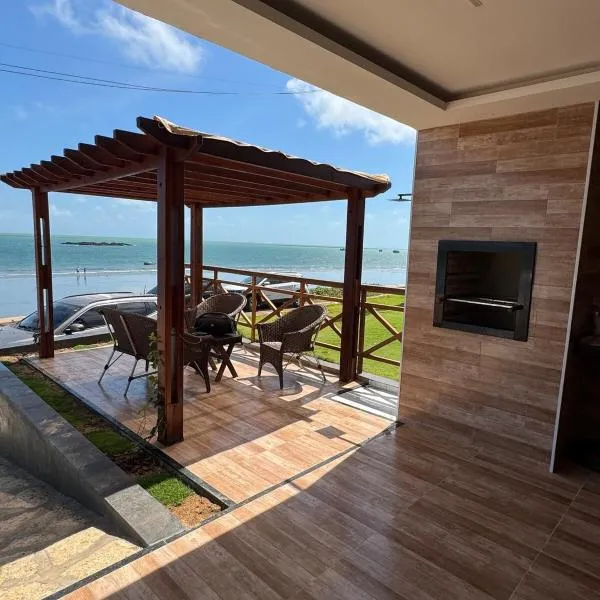 Casa da Maré Pé na areia Suítes climatizadas e deck vista mar,位于伊卡普伊的酒店