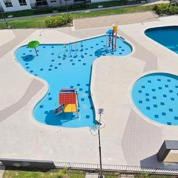 Condominio AZUL RICAURTE Apartamento con 4 piscinas，位于里考尔特的酒店