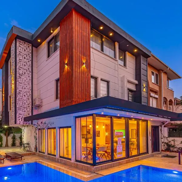 Casa Rosa Luxury Villa w heated Pool，位于贝莱克的酒店