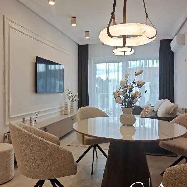 Gold Apartment F78 Let's Sea Baltic Park Gąski，位于贡斯基的酒店