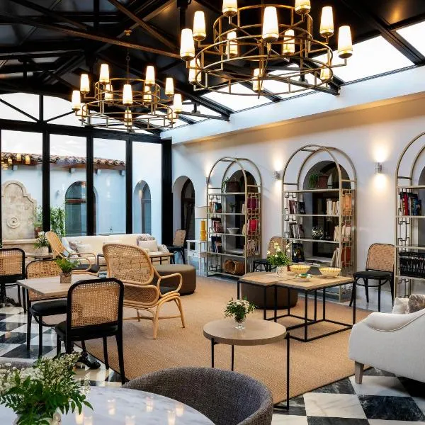 阿雷纳莱斯宫殿霍斯皮斯及spa酒店，位于卡塞雷斯的酒店