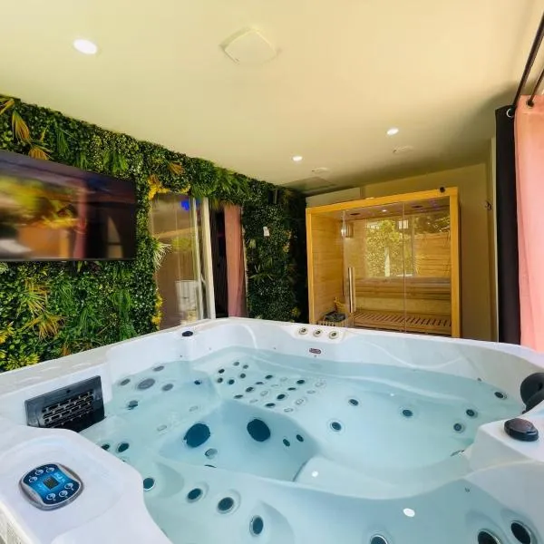 Suite avec jacuzzi et sauna，位于巴纽勒森林的酒店