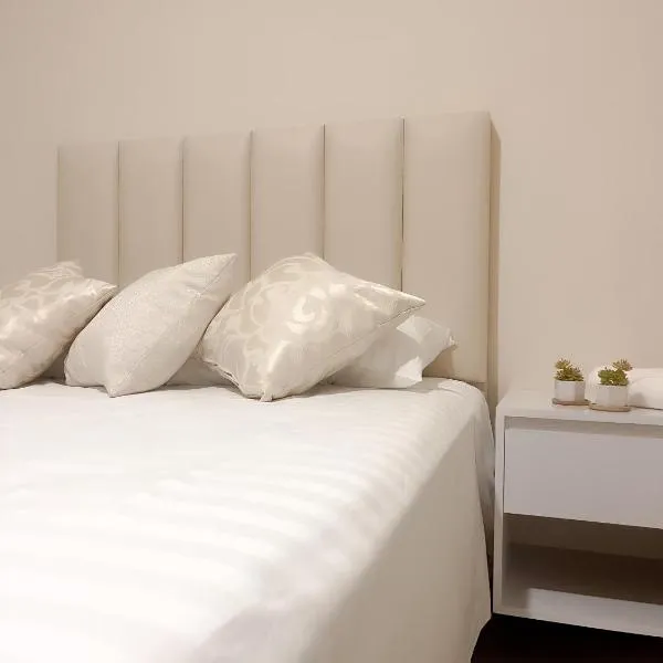 Posada Express Confort Check-In & Free Airport Taxi，位于Isla del Mono的酒店