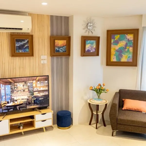 Kate & Keith's Place - Tambuli Seaside Living，位于Lapu Lapu City的酒店