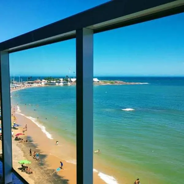 Apartamento Pé na Areia com Vista Deslumbrante do Mar，位于瓜拉派瑞的酒店