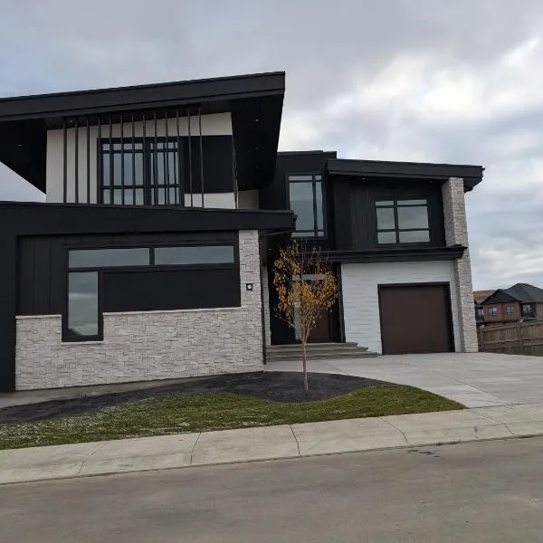 21 Greenwich Common NW Calgary Alberta，位于卡尔加里的酒店