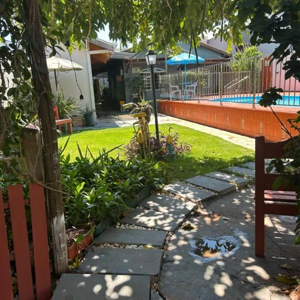 Pousada e Hotel Italian Garden House，位于大坎普的酒店