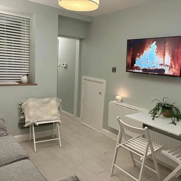 Cosy Ground-Floor Flat in Omagh Centrally located，位于奥马的酒店