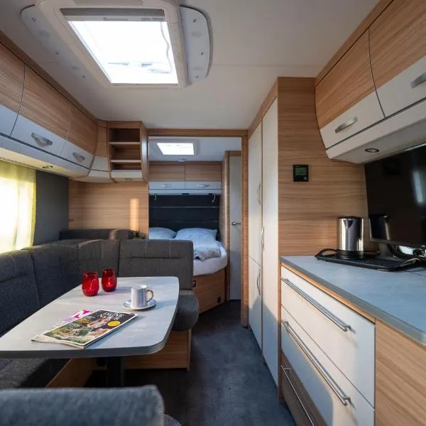 Kleines Mobilheim mit toller Ausstattung und Vorzelt im Heide Resort Brüggen，位于布吕根的酒店