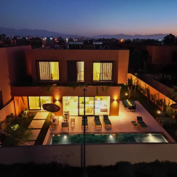 Villa Marleanis 5 suites 300m2 piscine chauffée privative 11m de long résidence avec gardien，位于马拉喀什的酒店