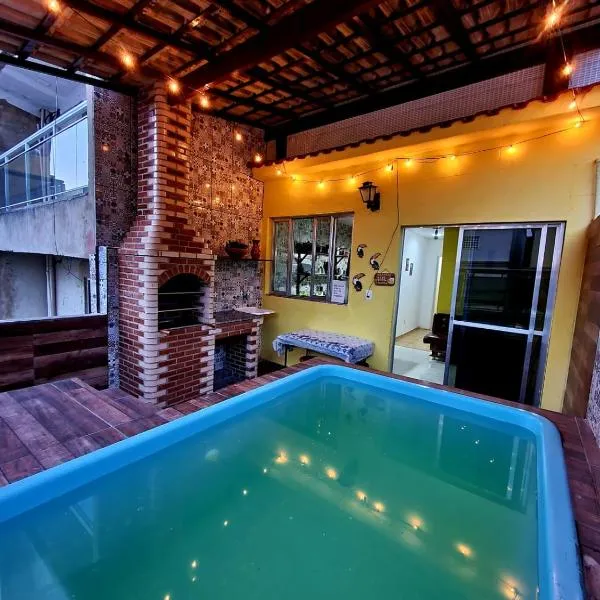 Cantinho Feliz de Muriqui / Casa amarela，位于曼加拉蒂巴的酒店