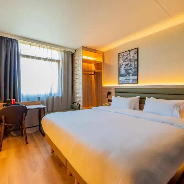 布雷达钟楼酒店及餐厅，位于布雷达的酒店