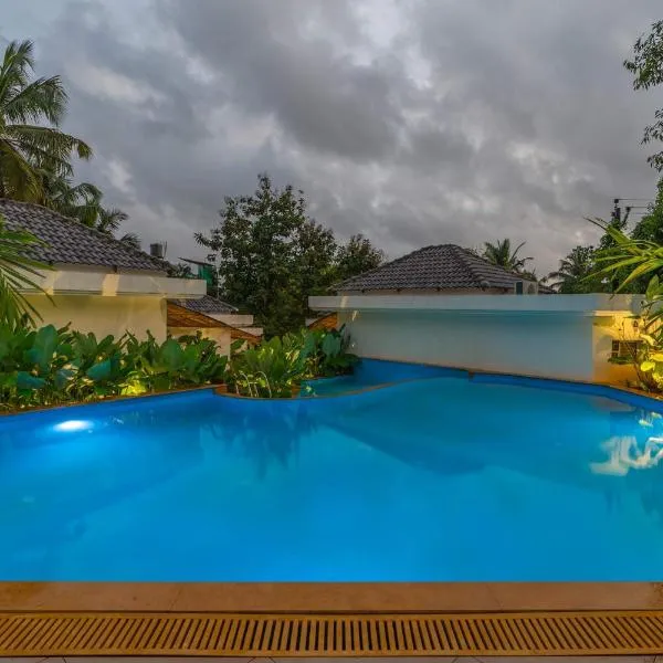 StayVista at Kuhu Natures Resort with BBQ, Pool，位于曼德姆的酒店