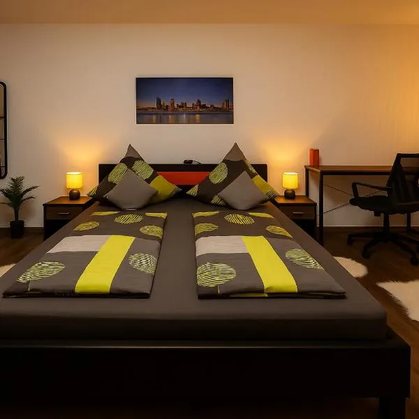 Homefeld Suite - Elegante und moderne Ferienwohnung zentral in Hünfeld bei Fulda mit Küche, kostenlosem Parkplatz und WLAN，位于欣费尔德的酒店