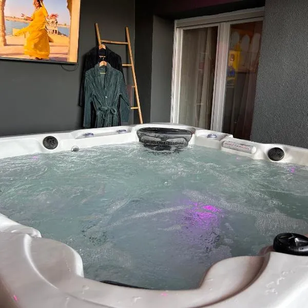 la suite prestige avec SPA SAUNA NETFLIX JARDIN，位于Champigneulles的酒店