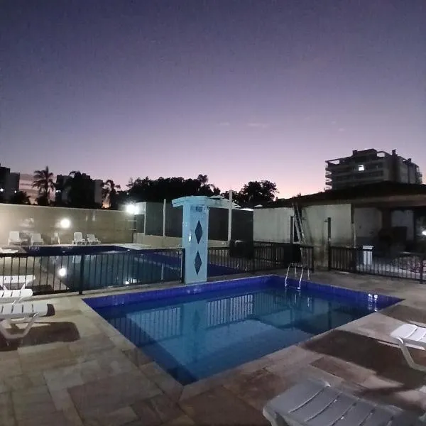 Lindo apartamento em frente à praia com piscina，位于伯迪亚哥的酒店