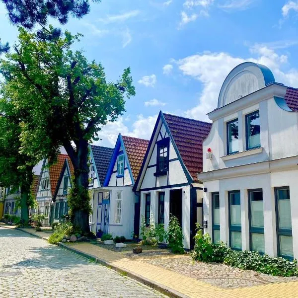 MAISON ART Appartements - Objekt 94080，位于瓦尔内明德的酒店