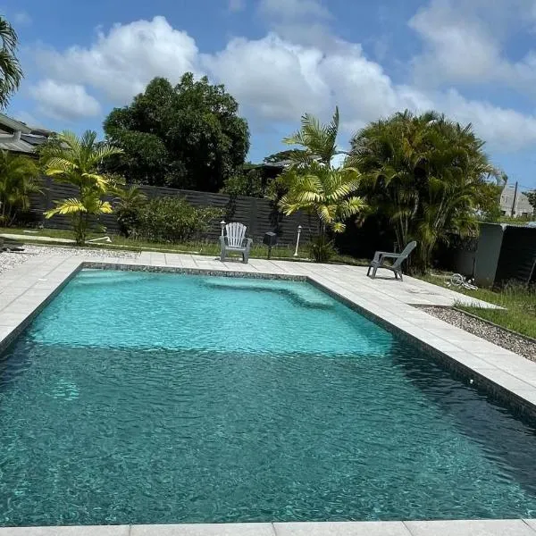 T3 moderne avec piscine partagée proche Family plazza，位于Matoury的酒店