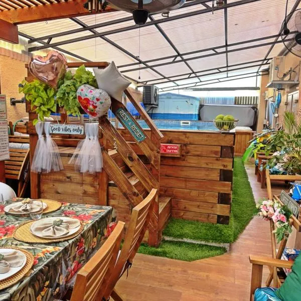 הפינה של טלי בנהריה - יחידות אירוח וספא בריאות，位于纳哈里亚的酒店