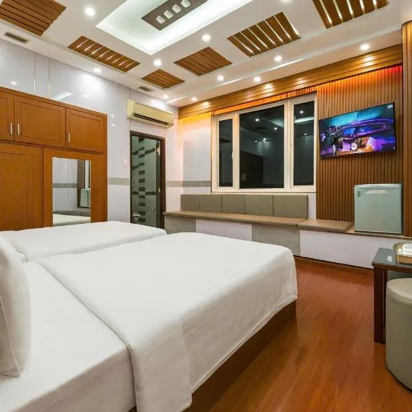 Van Ha Hotel Etown - Nhà Ga T3 Sân Bay TSN，位于胡志明市的酒店