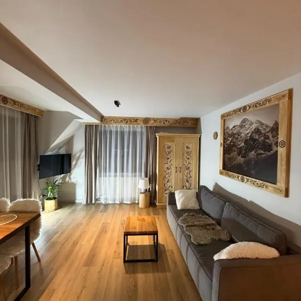 GÓRALSKIE NOWE APARTAMENTY BIAŁKA - Skibus, Sauny, Bania, Sale zabaw - w cenie，位于Białka Tatrzanska的酒店