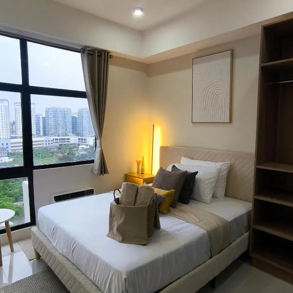 BH UrbanSky Condo，位于麦克坦的酒店