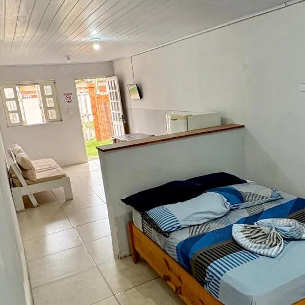 Kitnet a 150m da praia com Ar Condicionado，位于里奥格兰德的酒店