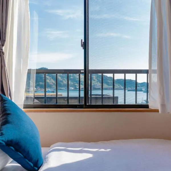 オーシャンフロント日南 天福球場近く 駐車場2台無料 Good Stay Apartment，位于日南的酒店