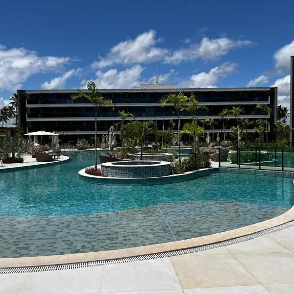 Flat Alto Padrão com 2 quartos em Muro Alto - Porto de Galinhas - 217 B - Beach Class Verano，位于伊波茹卡的酒店