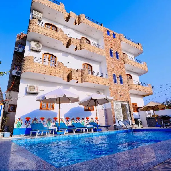 Sun wing guest house，位于卢克索的酒店