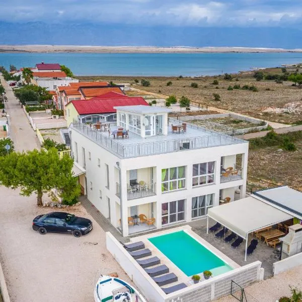 Family-friendly apartments with swimming pool Vir - 23976，位于维尔的酒店