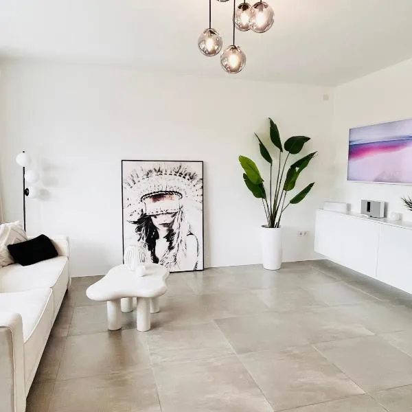 Apartment LilaMoon Unna Dortmund Flughafen Parkplatz Netflix Disney plus 80qm Erdgeschoss,位于翁纳的酒店