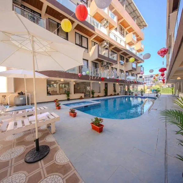 La Bela Casa Suites, Candolim，位于坎多林的酒店