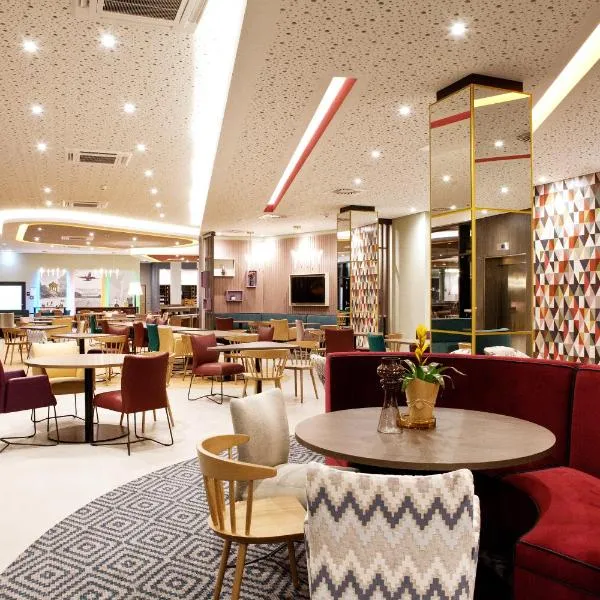 Hampton by Hilton Munich Airport South，位于哈尔伯格摩斯的酒店