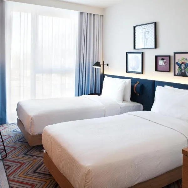 Hampton by Hilton Munich Airport South，位于哈尔伯格摩斯的酒店