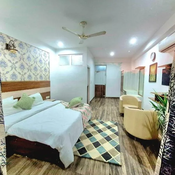 Acme Inn Suite，位于古尔冈的酒店