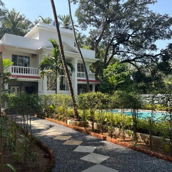 Nature's Inn Luxury Villa Morjim Goa, 4bhk and Sparkling Pool，位于莫尔吉姆的酒店