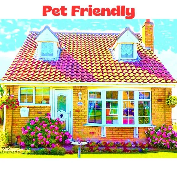 The Beach House! Holiday with Family & Friends at this Cosy Coastal Cottage in Sutton on Sea with Beach & Attractions just mins away! Perfect for Couples & Family Stays with Free Parking, Large Garden & Free WiFi，位于滨海萨顿的酒店