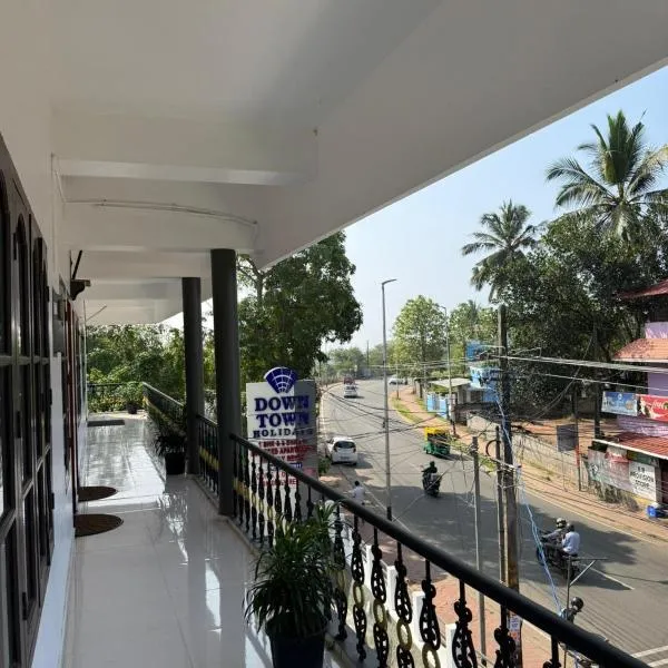 DOWN TOWN HOLIDAYS Kovalam，位于可瓦兰的酒店