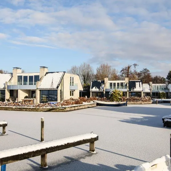 阿姆斯特丹/鲁斯德雷奇璃园范登布如科村度假屋，位于洛斯德雷赫特的酒店