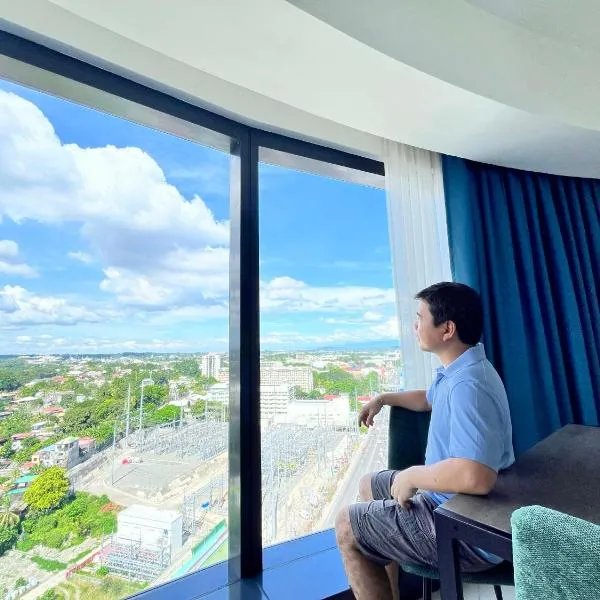 Minimalist 1BR Condo with NETFLIX at AEON TOWERS near Abreeza Mall by Rico，位于达沃市的酒店