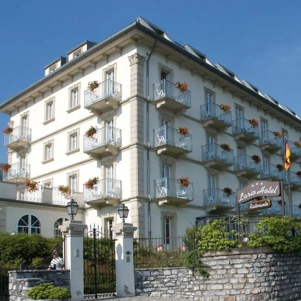 拉里奥酒店，位于Regoledo的酒店